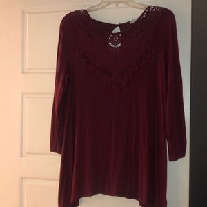 maroon blouse with lace features